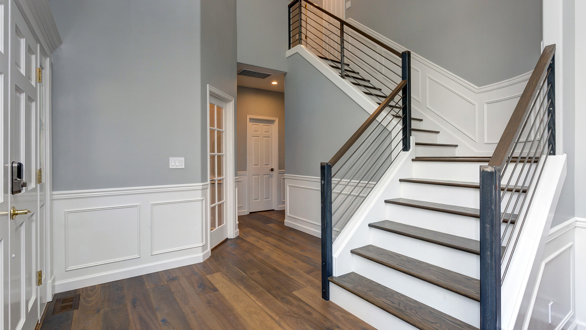 white staircase with wooden tops and wire railings round rock tx